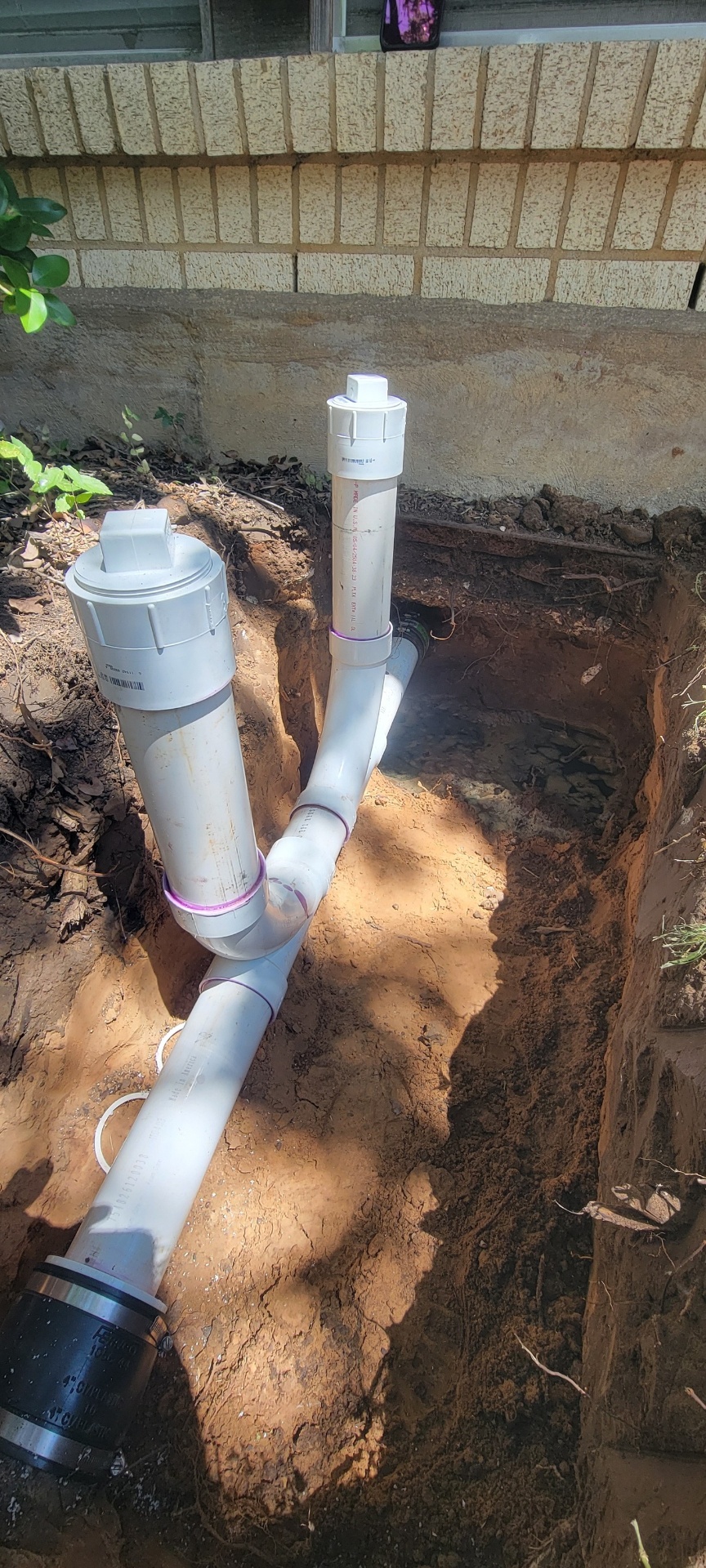 Trenched PVC drain pipe repair